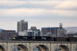 Empty coal train rolls west over the bridge